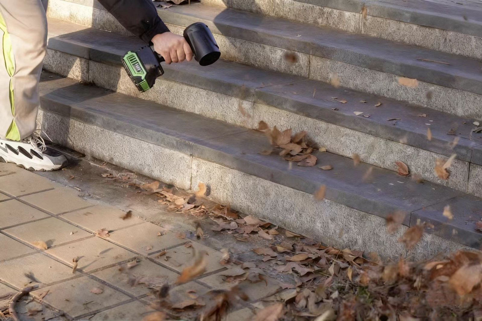  Booster TF64C Electric Leaf Blower blowing fallen leaves